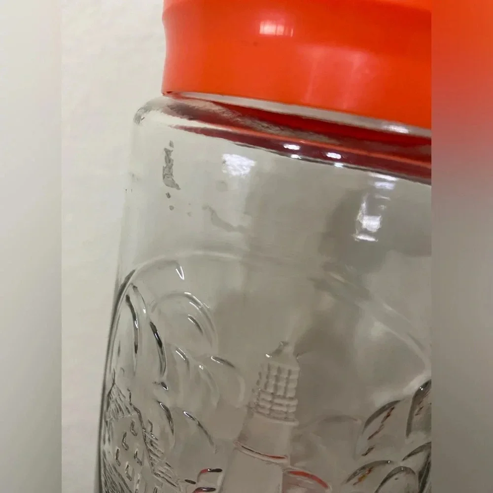 Set of 2 Anchor Hocking Glass Tang Jar Orange Lid Lighthouse Storage Canister